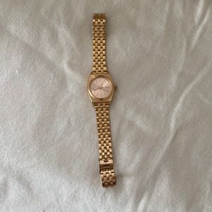 Nixon Time Teller rose gold watch